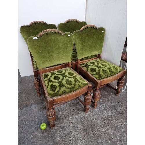 588 - Four antique wooden chairs with plush green upholstery in very good condition. Overall height is 87c... 