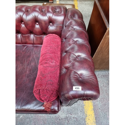 496 - A Super 3 Seater Ox Blood Chesterfield Couch, With Button Rolled back in good order