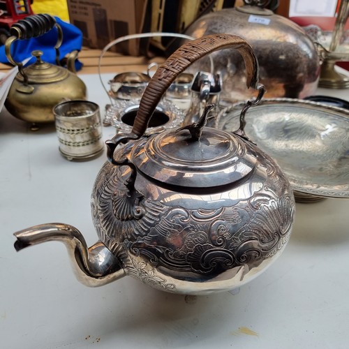 470 - 10 Silver Plated, Brass and Epns items including tea pots, jugs and meat domes. Includes an interest... 