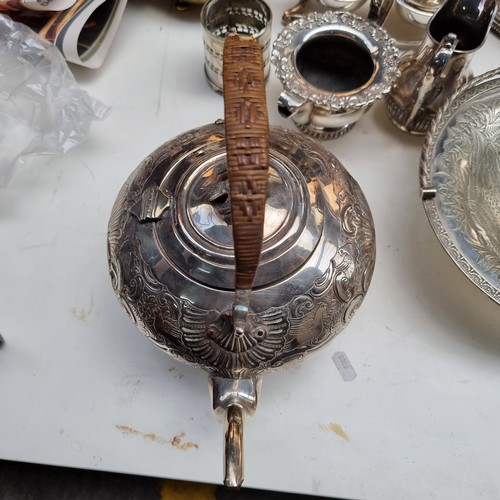 470 - 10 Silver Plated, Brass and Epns items including tea pots, jugs and meat domes. Includes an interest... 