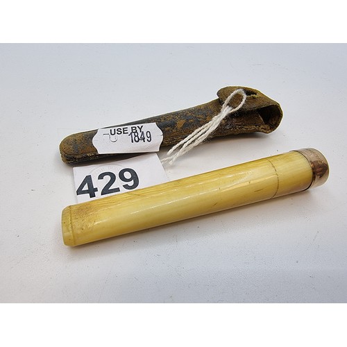 429 - A bone cheroot holder with 9 carat gold end.  fitting with leather case.