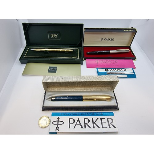 428 - 10 carat gold plated Cross ballpoint pen, in presentation box and two Parker fountain pens, both wit... 