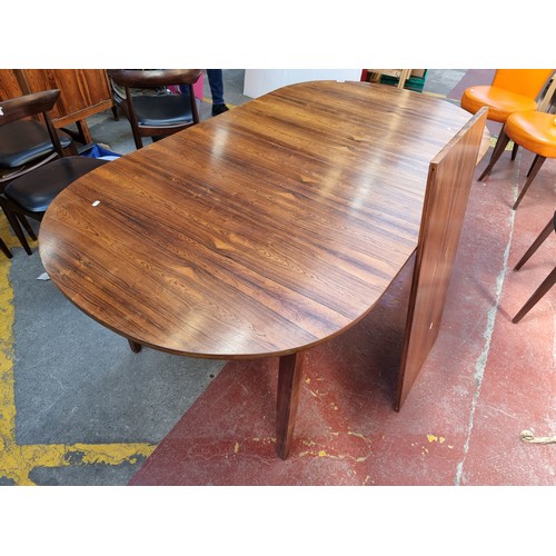 307 - Fabulous Extending Tiger Rosewood Extending Mid Century Dining Table. Lovely lovely example. Matches... 