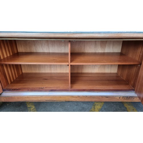 299 - Mid Century Rosewood sideboard with three drawers and two cupboards and a glass saver top. . Mm: 220... 