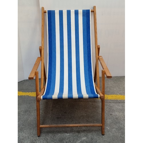 254 - Blue and white striped deck chairs. Super cool folding wooden chairs in good order.