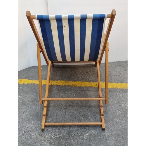 254 - Blue and white striped deck chairs. Super cool folding wooden chairs in good order.