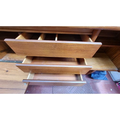 221 - Mid century teak sideboard. 76cm high, 212cm long, 43cm deep Nice example.