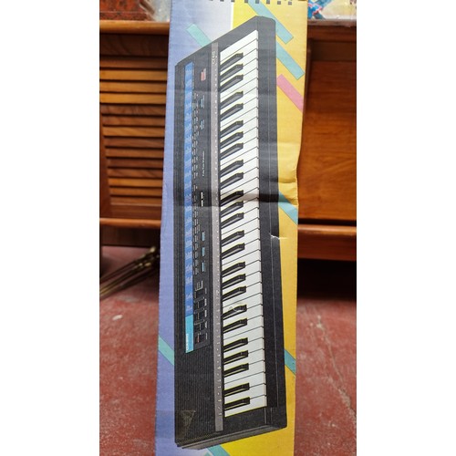 204 - Casio CT-615 Tonebank Keyboard new old stock Casio keyboard with a keyboard stand. Brand New, old st... 