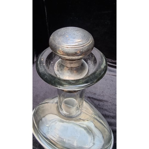 201 - Vintage glass decanter with silver toned base and stopper. Super shape has a great look.