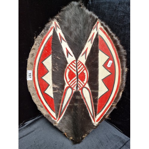 197 - Interesting vintage painted tribal shield made of animal hide and fur.