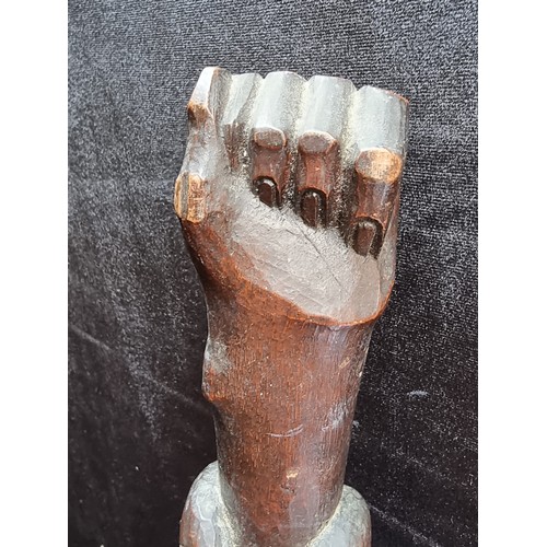 176 - Antique African tribal club with carved end and carved clenched fist