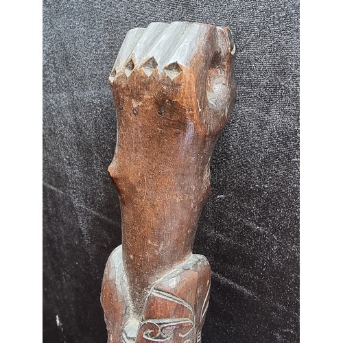 176 - Antique African tribal club with carved end and carved clenched fist