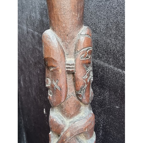 176 - Antique African tribal club with carved end and carved clenched fist