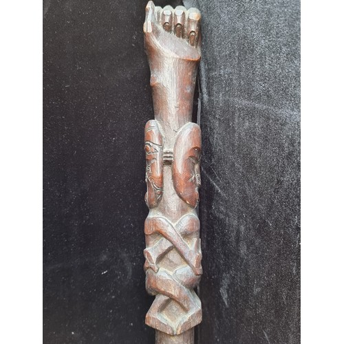 176 - Antique African tribal club with carved end and carved clenched fist