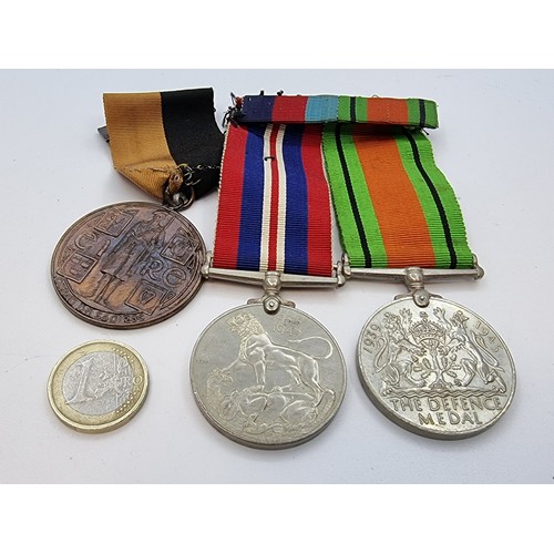 396 - Collection of 3 medals, two for 1939-45 (one a Defense medal), together with an Irish medal