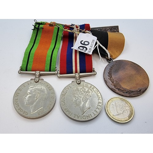 396 - Collection of 3 medals, two for 1939-45 (one a Defense medal), together with an Irish medal