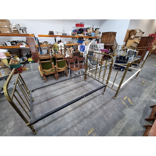 575 - Two vintage brass bed frames, including headboards, footboards (on wheels) and rails. 136cm wide and... 