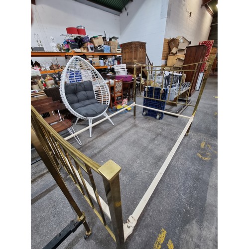 575 - Two vintage brass bed frames, including headboards, footboards (on wheels) and rails. 136cm wide and... 