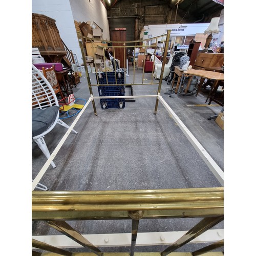 575 - Two vintage brass bed frames, including headboards, footboards (on wheels) and rails. 136cm wide and... 