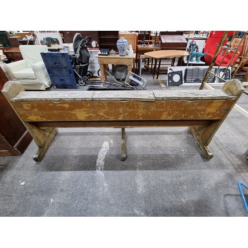 596 - Large antique wooden church pew. 90cm h x 207cm w x 42cm  Would be a great resto project.