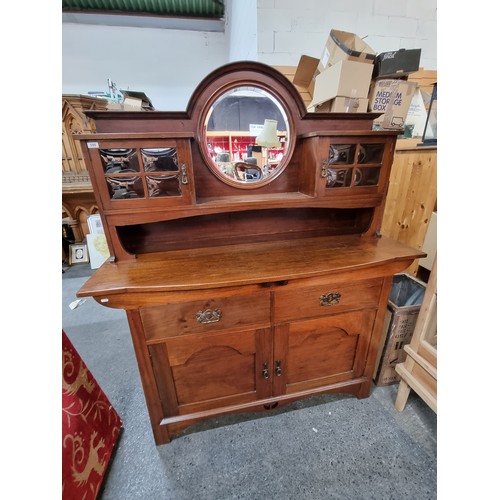 598 - Art Nouveau sideboard with boule bevelled glass and round bevelled mirror. In very good condition. 1... 