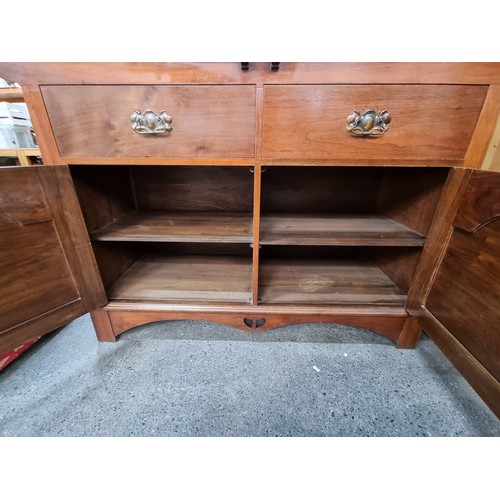 598 - Art Nouveau sideboard with boule bevelled glass and round bevelled mirror. In very good condition. 1... 