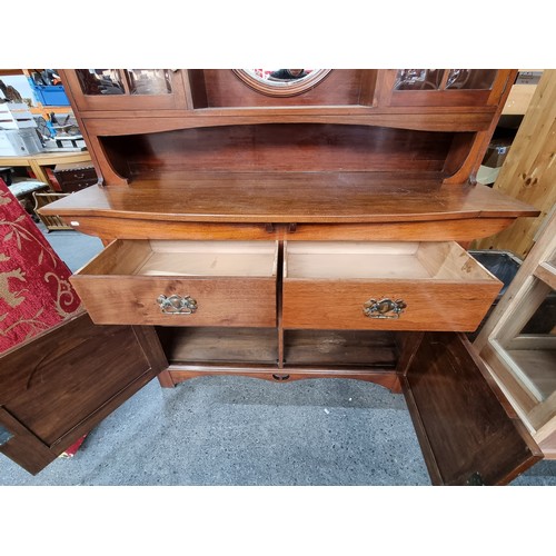 598 - Art Nouveau sideboard with boule bevelled glass and round bevelled mirror. In very good condition. 1... 