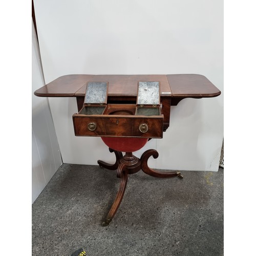 703 - A Super Flame Mahogany Tea table with Pull Out Tea Caddy Compartments including Space For a Mixing B... 