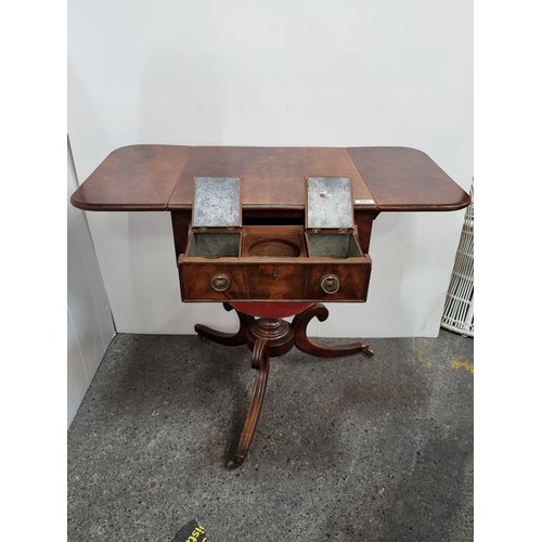 703 - A Super Flame Mahogany Tea table with Pull Out Tea Caddy Compartments including Space For a Mixing B... 