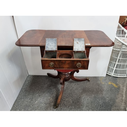 703 - A Super Flame Mahogany Tea table with Pull Out Tea Caddy Compartments including Space For a Mixing B... 