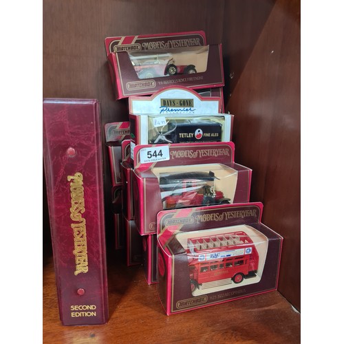 544 - Eleven Matchbox 'models of yesteryear' model cars, including binder with information booklet