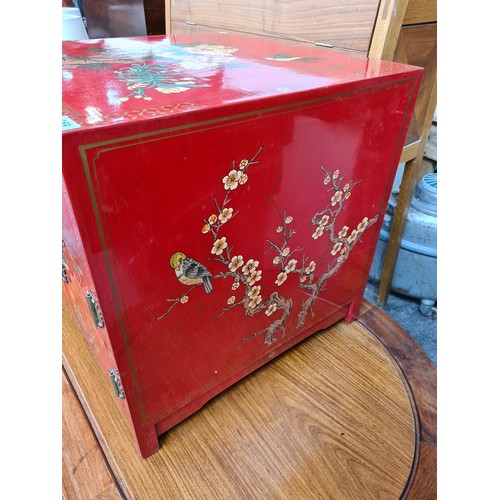 659 - A Fabulous Red Lacquered Hand Painted Chinese Cabinet.