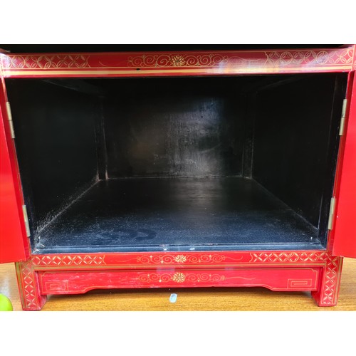 659 - A Fabulous Red Lacquered Hand Painted Chinese Cabinet.