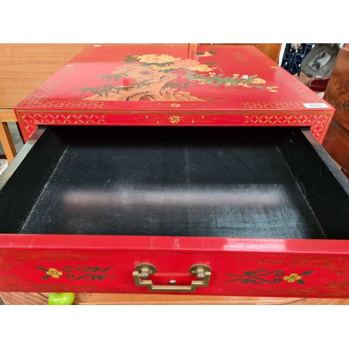 659 - A Fabulous Red Lacquered Hand Painted Chinese Cabinet.