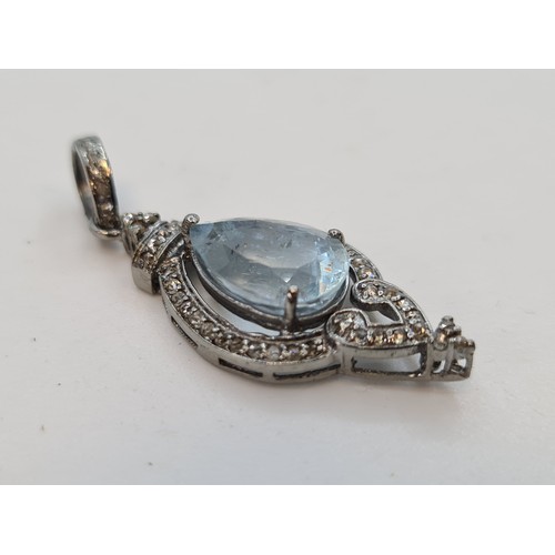 714 - Indian Silver pendent with cushion cut diamonds and a pear shaped 8.6 carat Aqua Marine. Lovely pend... 