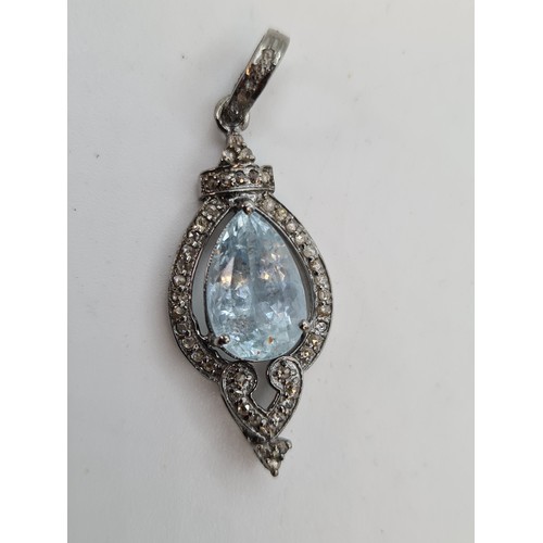 714 - Indian Silver pendent with cushion cut diamonds and a pear shaped 8.6 carat Aqua Marine. Lovely pend... 