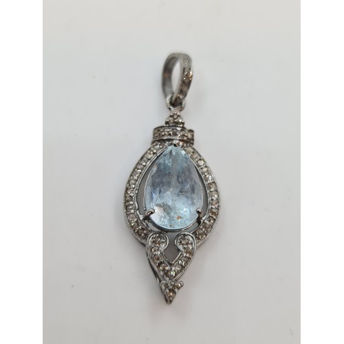 714 - Indian Silver pendent with cushion cut diamonds and a pear shaped 8.6 carat Aqua Marine. Lovely pend... 