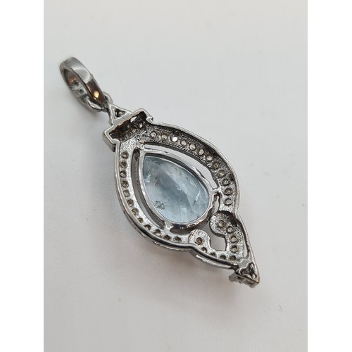 714 - Indian Silver pendent with cushion cut diamonds and a pear shaped 8.6 carat Aqua Marine. Lovely pend... 