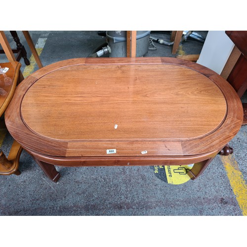 660 - An Oval Rose Wood Coffee Table, in The Chinese Style.