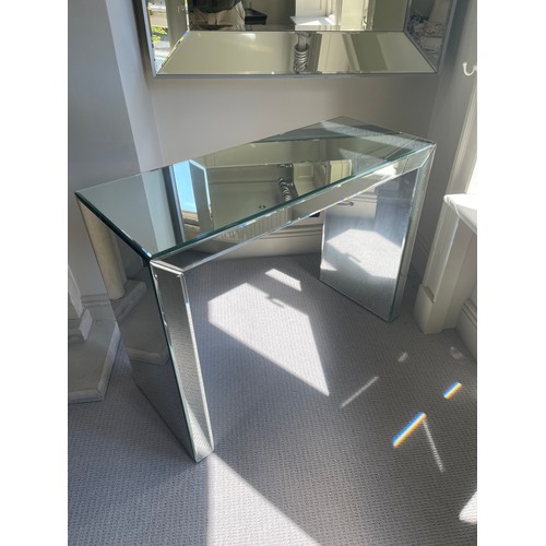 83 - Silver bevelled mirror table 75 cm x 101 cm x 41 cm. Slight crack on the front, but very striking pi... 