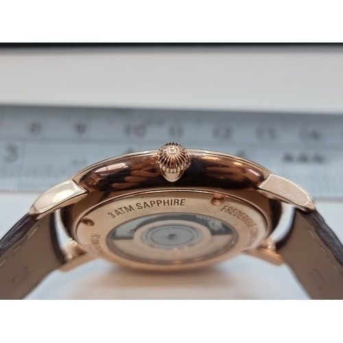 4 - A Frederique Constant Geneve gentleman's watch, in excellent condition, with associated leather stra... 