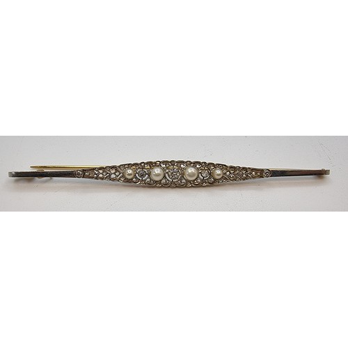15 - Edwardian 18 carat and platinum long brooch with diamonds & natural pearls. Mounted on foliage desig... 