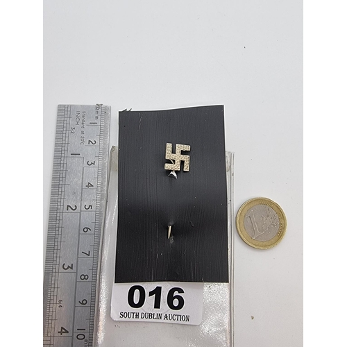 16 - A metal embossed design swastika tie pin. Clean example.