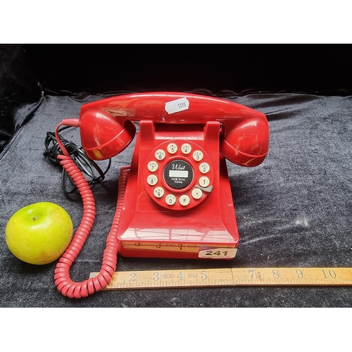 241 - A Retro Style Red Telephone with a Fibre-Optic Cable