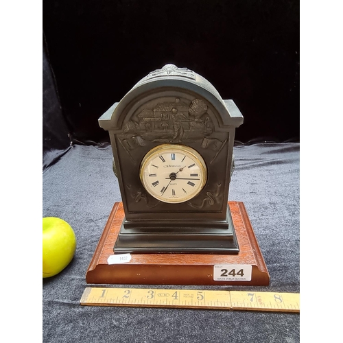 244 - A Heavy Genesis Quartz Clock on a Wooden Base with Golf Motif, Made In Germany
