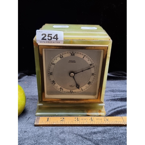 254 - A Heavy Antique Connemara  Elliott Clock with Irish Interest. In Working Condition.