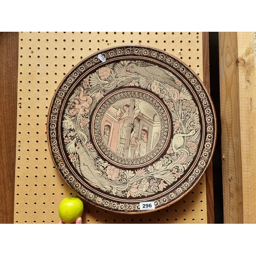 296 - A Large Indian Decorative Wall Plaque Featuring Floral Detail and a Bird Motif.