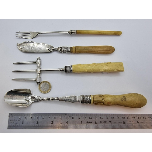 3 - A collection of four pieces of bone handled tableware. including Two sterling Silver items