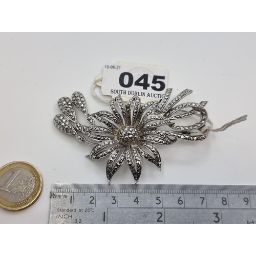 45 - A very large Sterling Silver floral designed marcasite stone brooch with all stones intact.  Dimensi... 