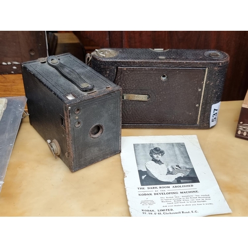 537 - An antique leather bound folding Kodak camera, model no.3, model G, patented, dated 1909 and a kodak... 